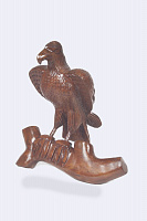 Carved eagle figurine on a mahogany stand AS-230